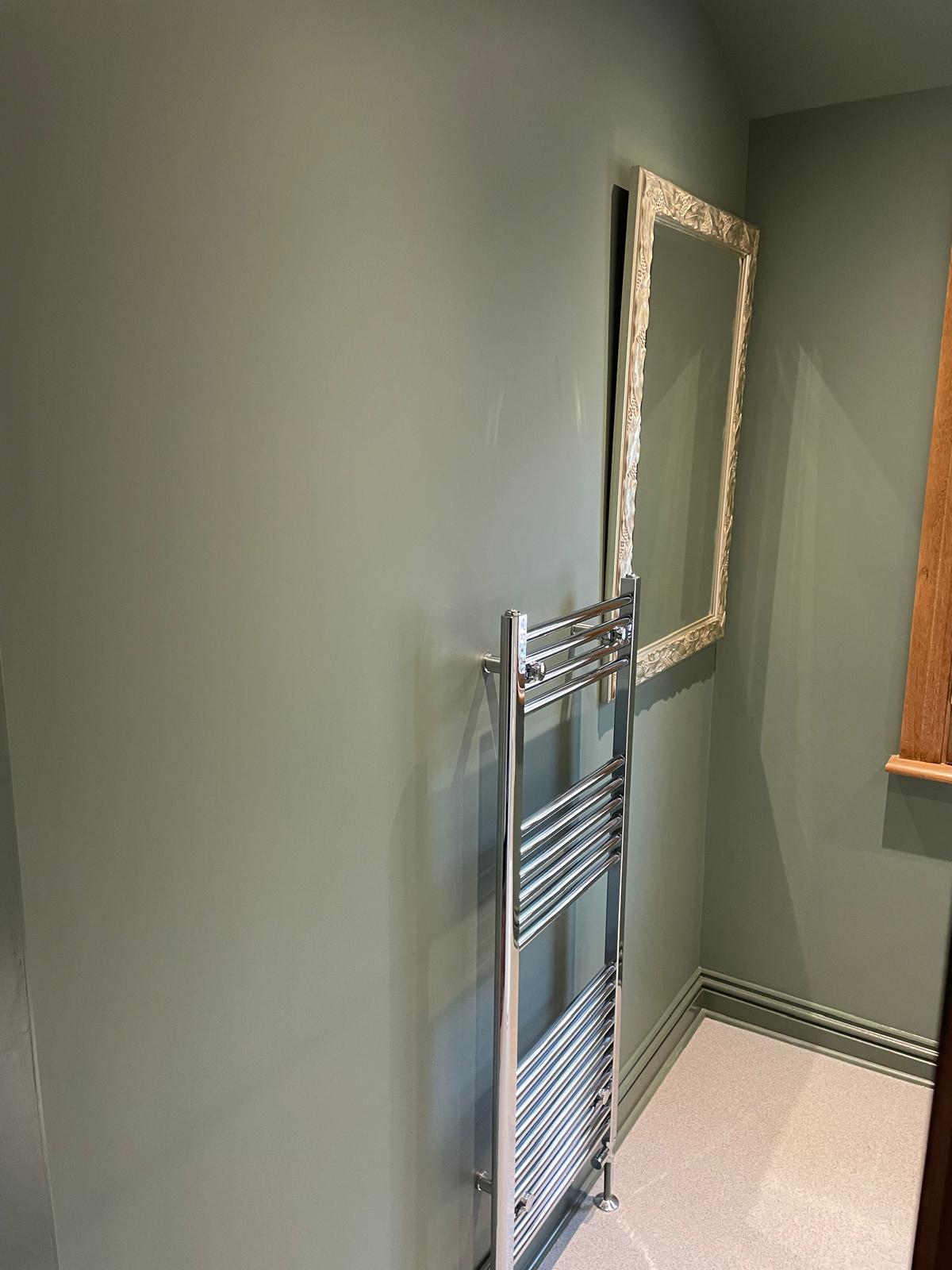 Bathroom renovation with heated towel rail