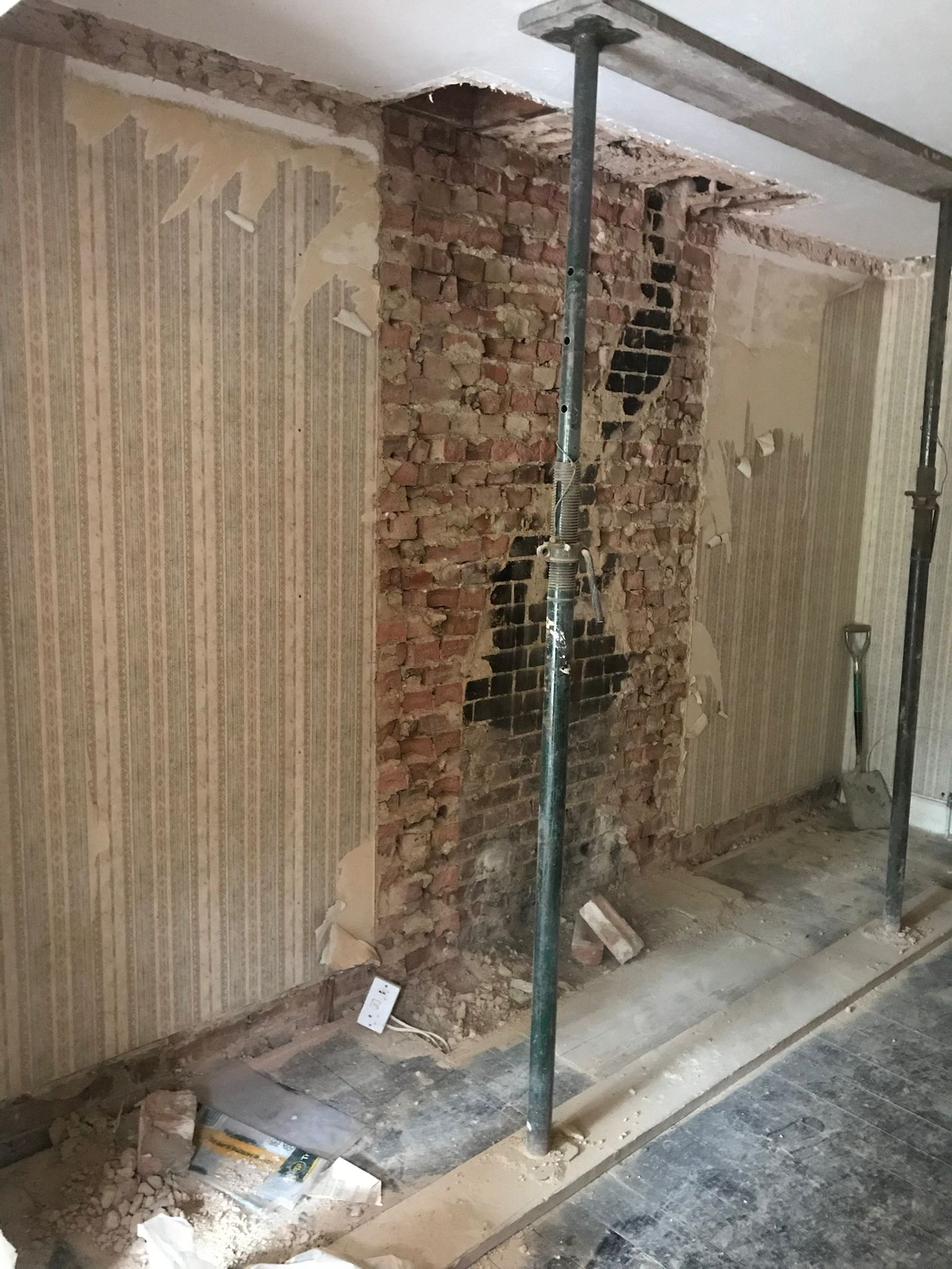 Shower room renovation in progress with glass shower screen